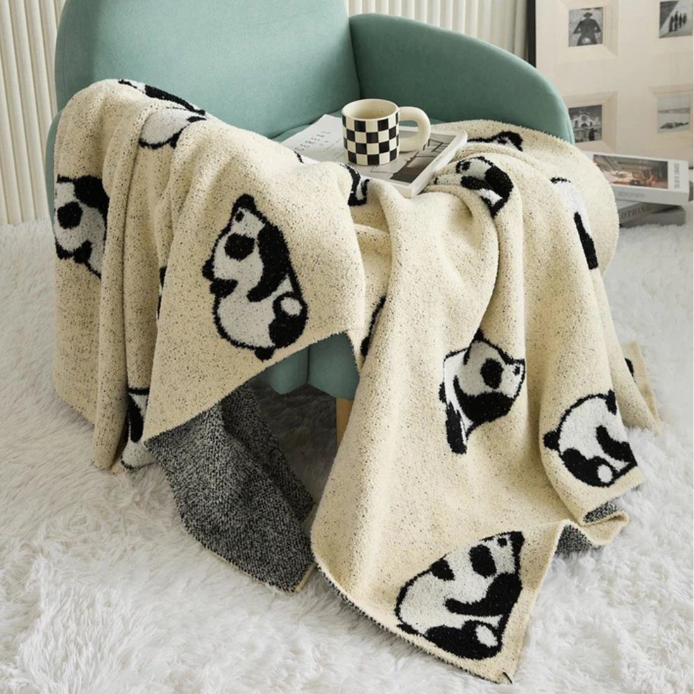 Solara – Plaid en maille jacquard doux et ludique